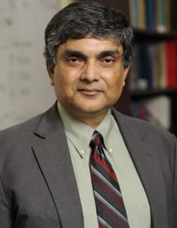 A picture of Dr. Somnath Ghosh in a professional attire